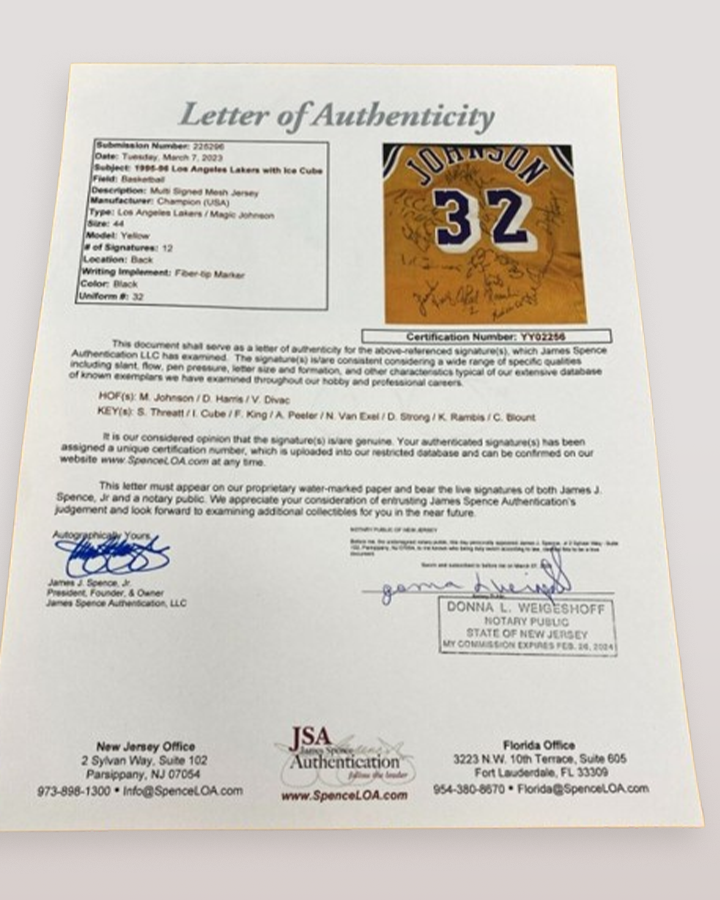 Magic Johnson's shirt signed by Magic, Ice Cube and players