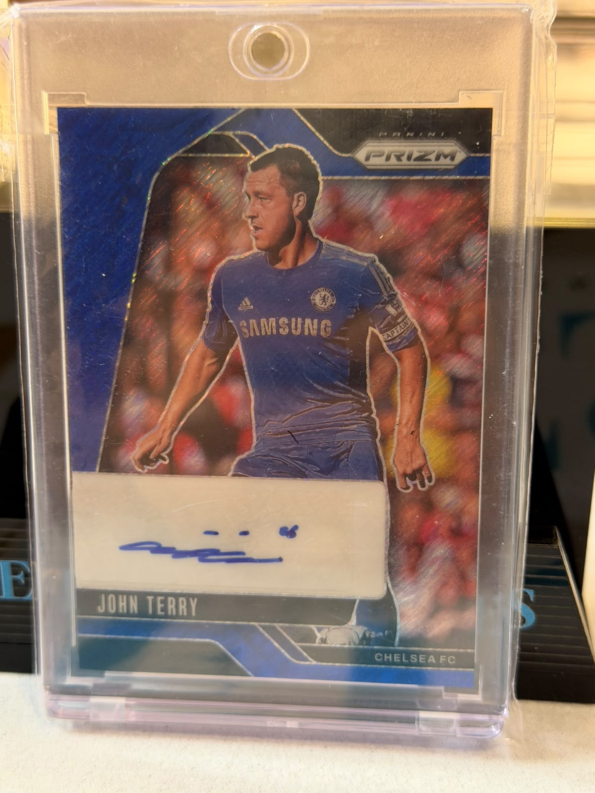 John Terry Signatures Autograph – 2024-25 Panini Prizm Premier League – Chelsea trading card, front