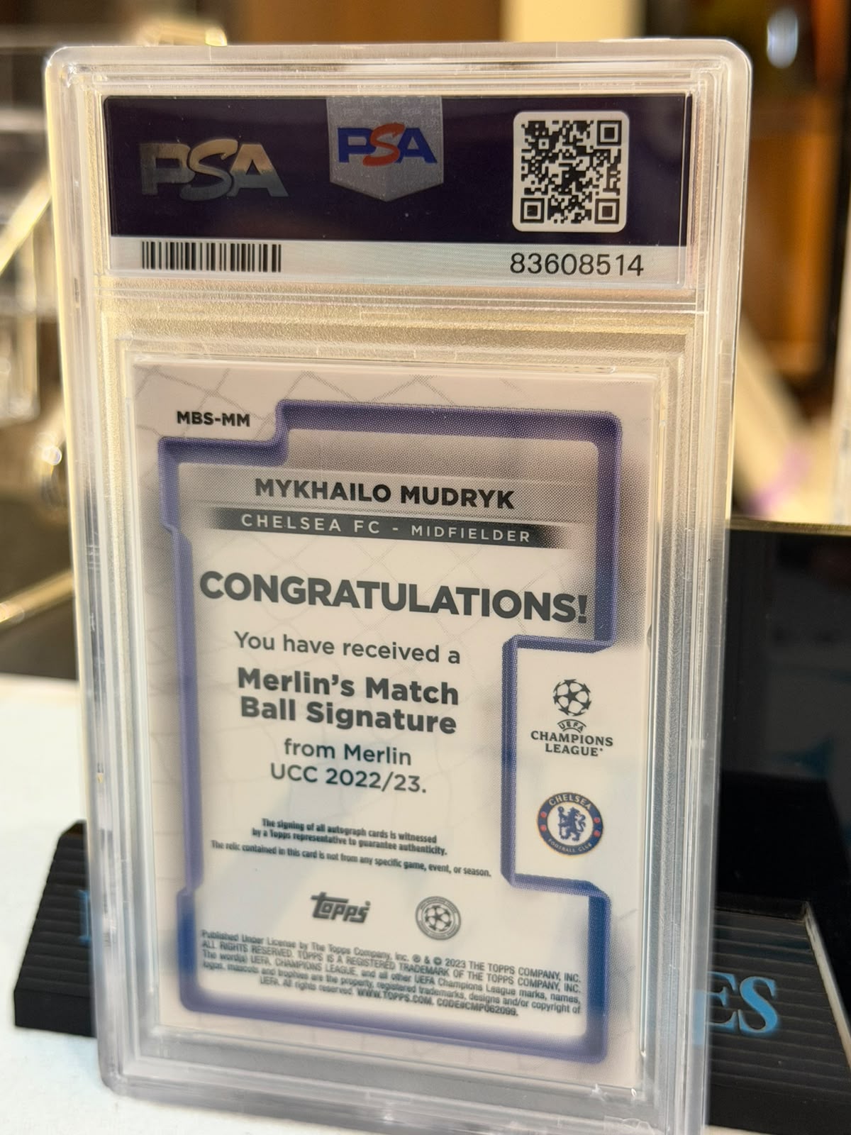 Mykhailo Mudryk Match Ball Signature RC – 2022-23 Merlin Chrome UCC (PSA 9) – Chelsea trading card, back