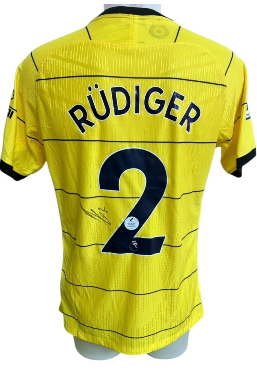 Close-up of Antonio Rudiger's signature on the Chelsea shirt