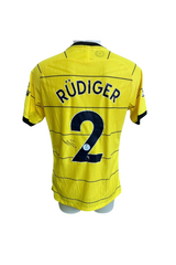 Front of the yellow Chelsea away replica shirt signed by Antonio Rudiger