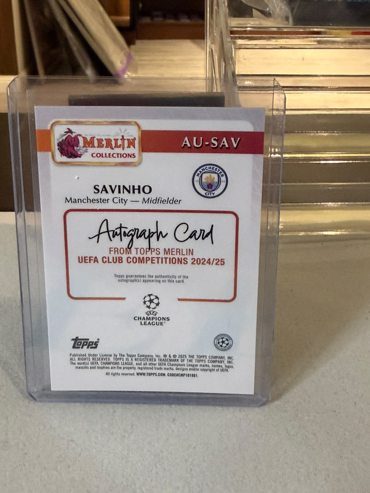 Savinho 19/25 – Merlin Autograph (Orange Refractor) – 2024-25 Topps Merlin Collections… – Manchester City trading card, back