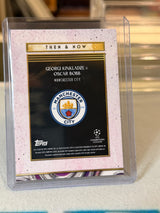 Georgi Kinkladze & Oscar Bobb 21/50 – Deco Then & Now (Purple) – 2024-25 Topps Deco UEF… – Manchester City trading card, back