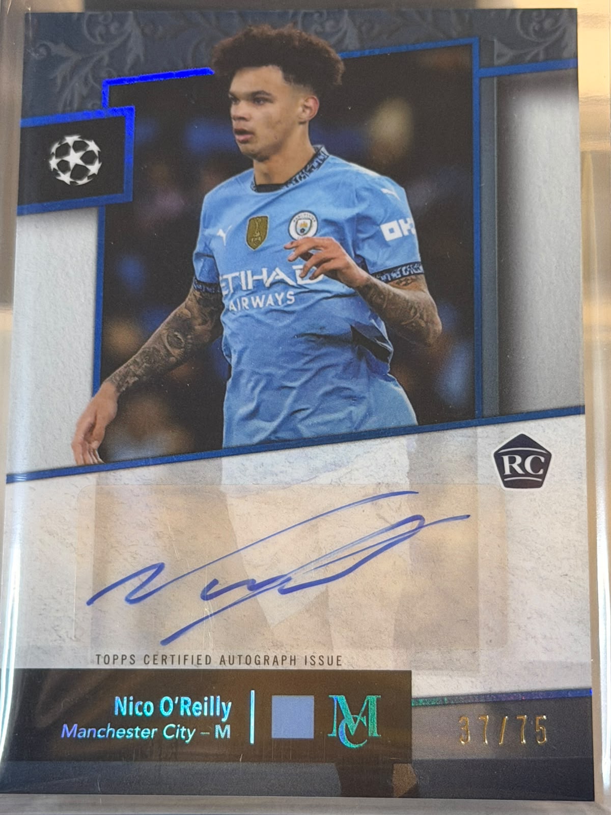 Nico O'Reilly 37/75 – Archival Autograph – 2024-25 Topps Museum Collection UEFA Club C… – Manchester City trading card, front