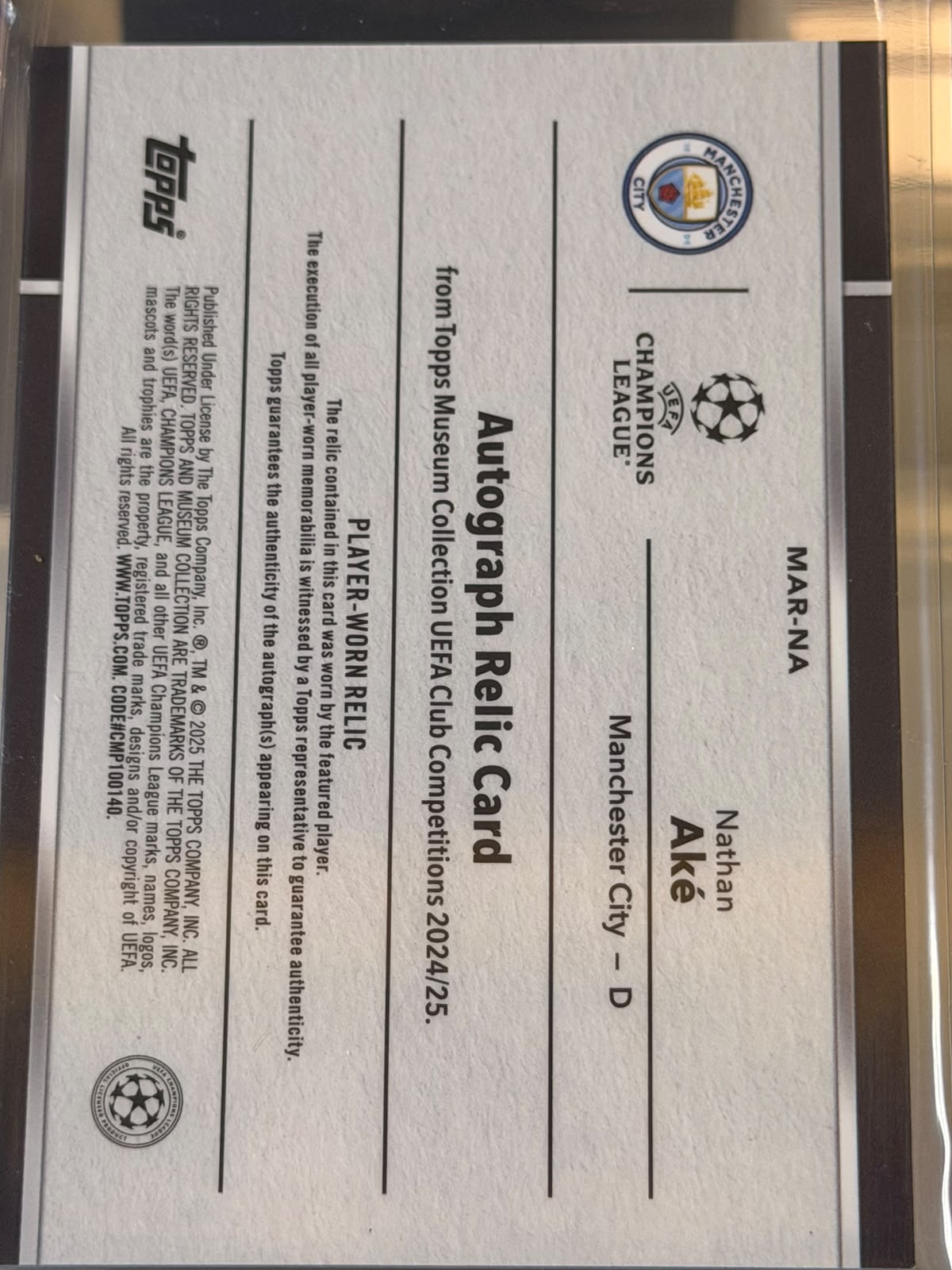 Nathan Ake 19/50 – Museum Autograph Relics – 2024-25 Topps Museum Collection UEFA Club… – Manchester City trading card, back