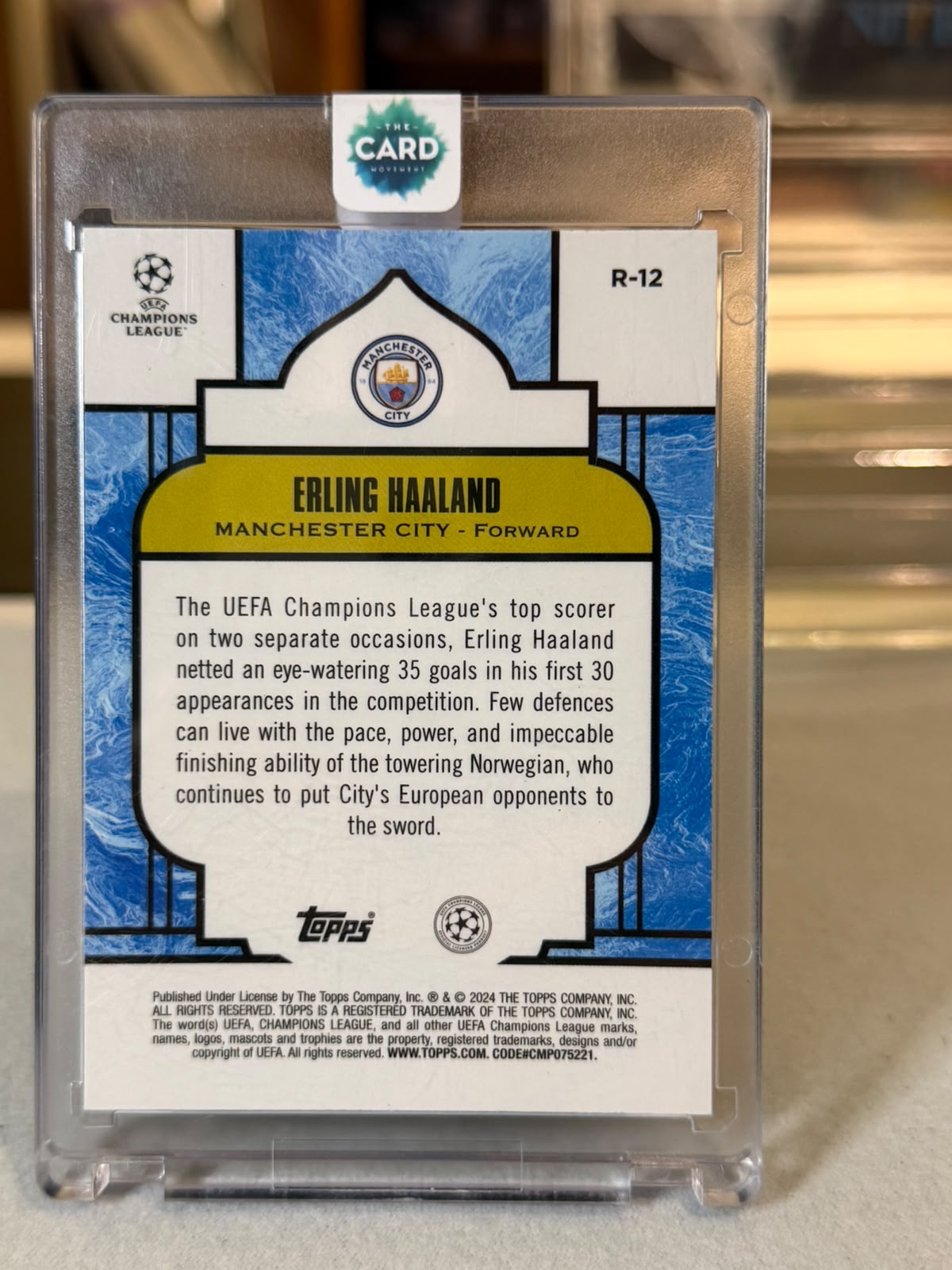 Erling Haaland R-12 – Renaissance – 2024-25 Topps Merlin UEFA Club Competitions – Manchester City trading card, back