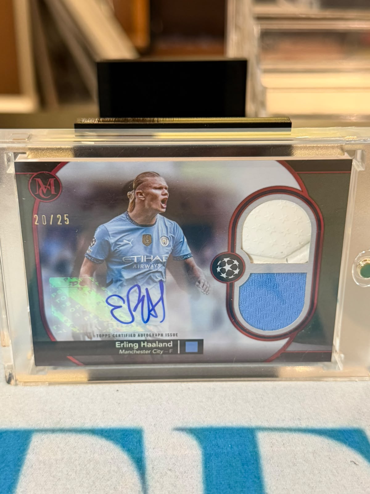 Erling Haaland 20/25 – Hat-Trick Autographed Relic – 2024-25 Topps Museum Collection U… – Manchester City trading card, front