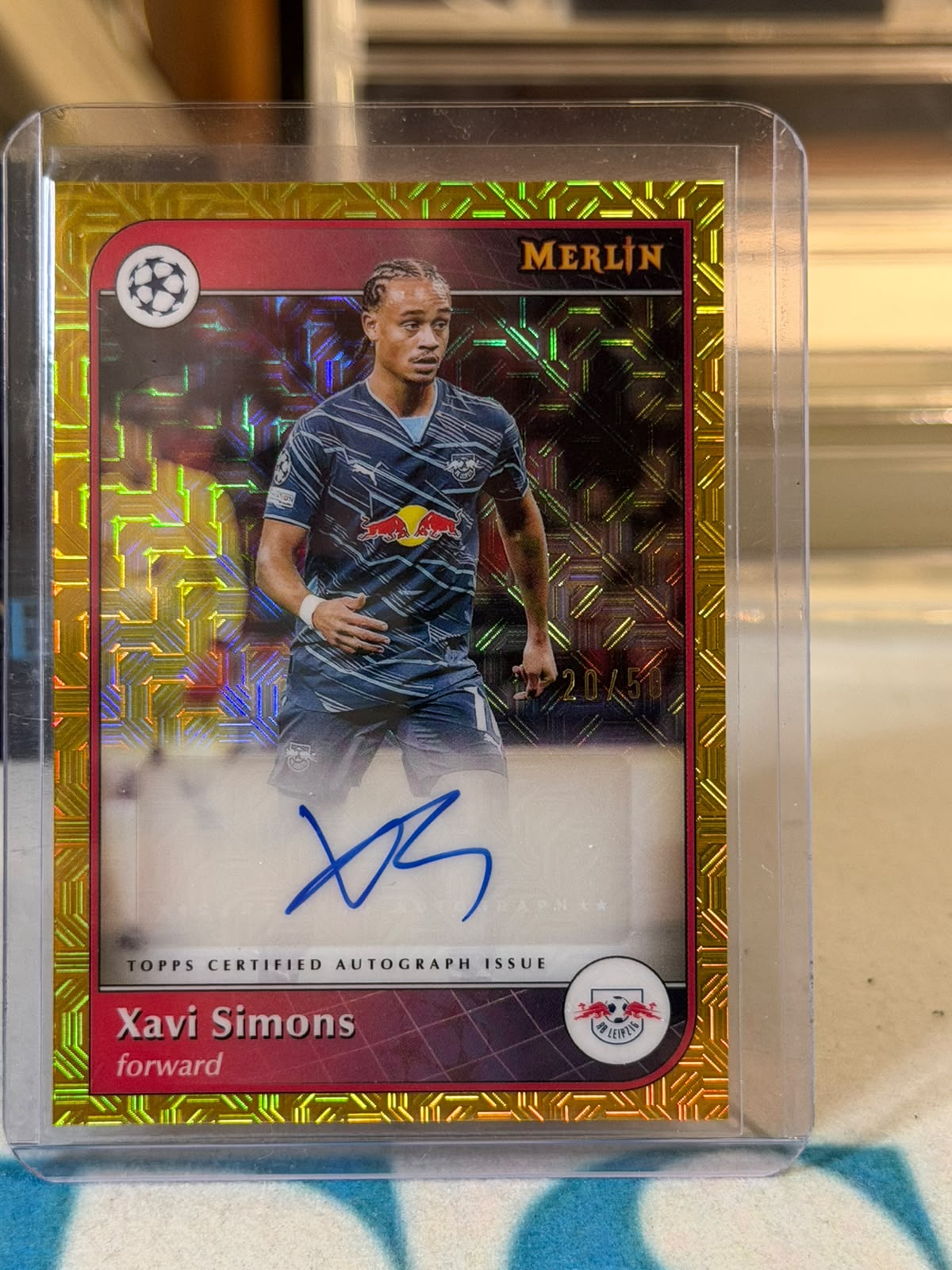 Xavi Simons 20/50 Merlin Autograph (Gold) – 2024-25 Topps Merlin UEFA Club Competitions – RB Leipzig trading card, front