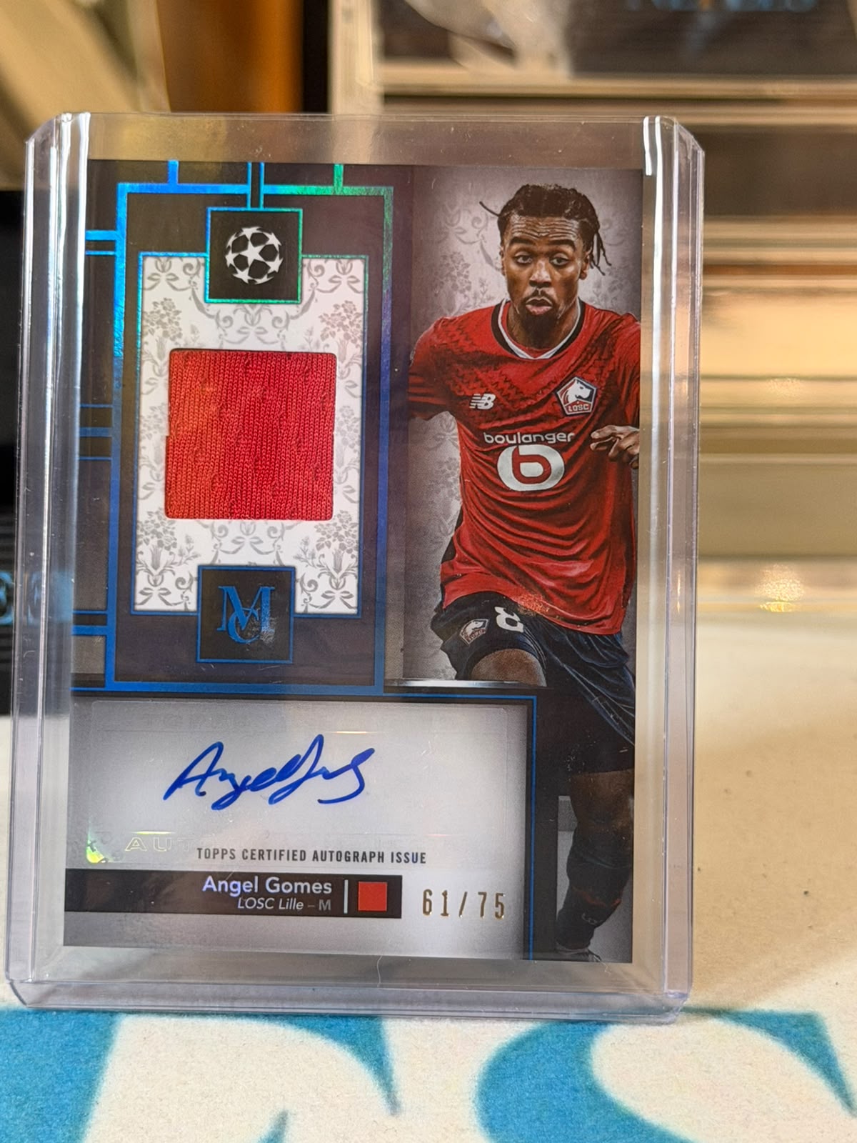 Angel Gomes 61/75 Autograph Relic (Sapphire) – Lille trading card, front