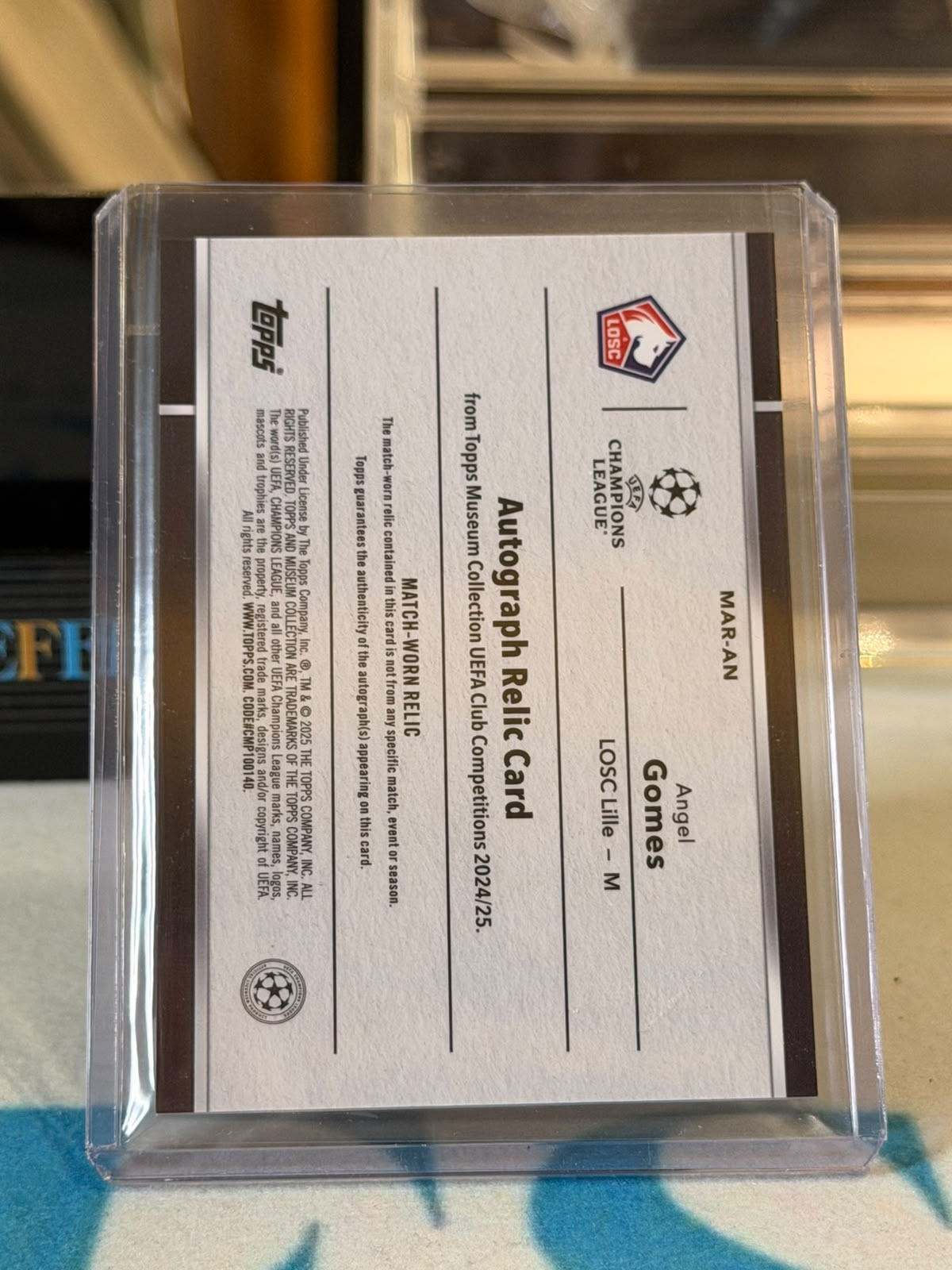 Angel Gomes 61/75 Autograph Relic (Sapphire) – Lille trading card, back