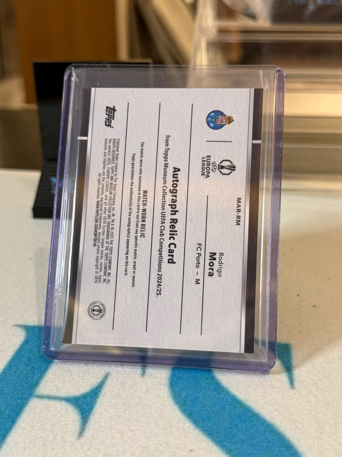 Rodrigo Mora 148/150 #MAR-RM – Autograph Relic (Citrine) – 2024-25 Topps Museum Collection UEF… – FC Porto trading card, back