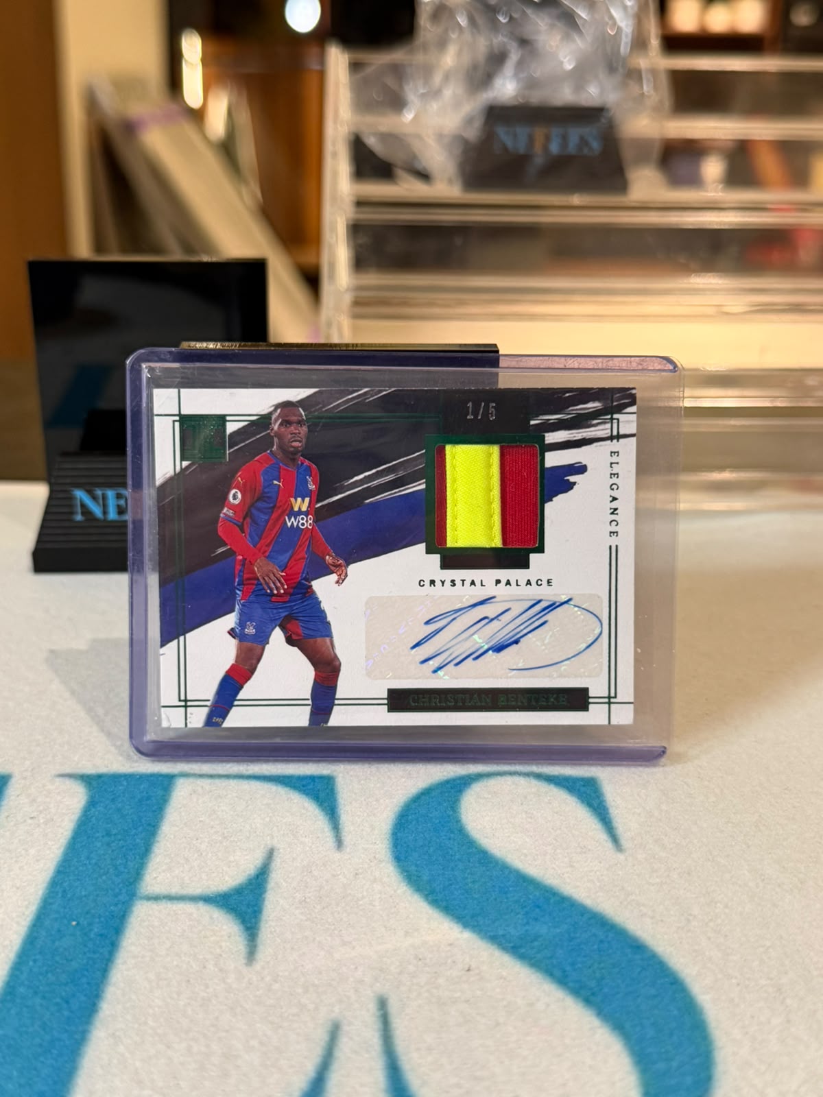 Christian Benteke 1/5 Elegance Jersey Auto – 2021-22 Impeccable Premier League – Crystal Palace card, front