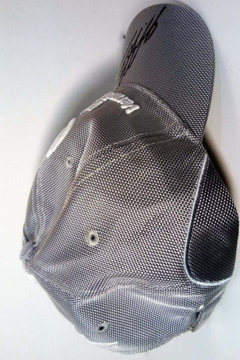 Side view of the DVAG Driver's Cap signed by Schumacher