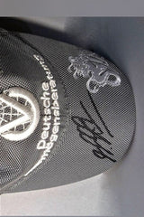 Back of the DVAG Driver's Cap signed by Michael Schumacher