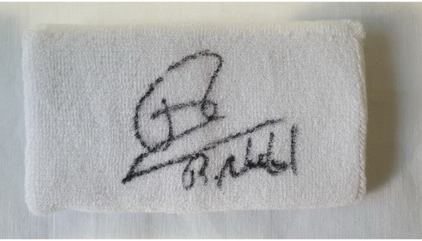 Nike wristband signed by tennis champion Rafa Nadal, side view