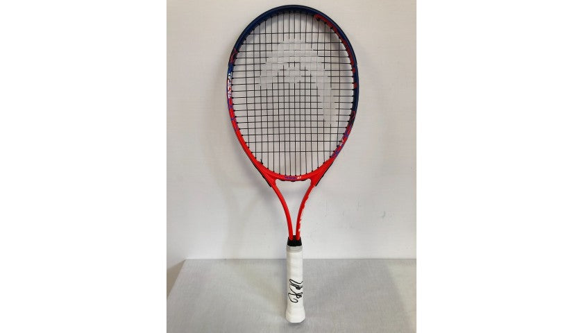 Strings and frame detail of the signed Head tennis racquet