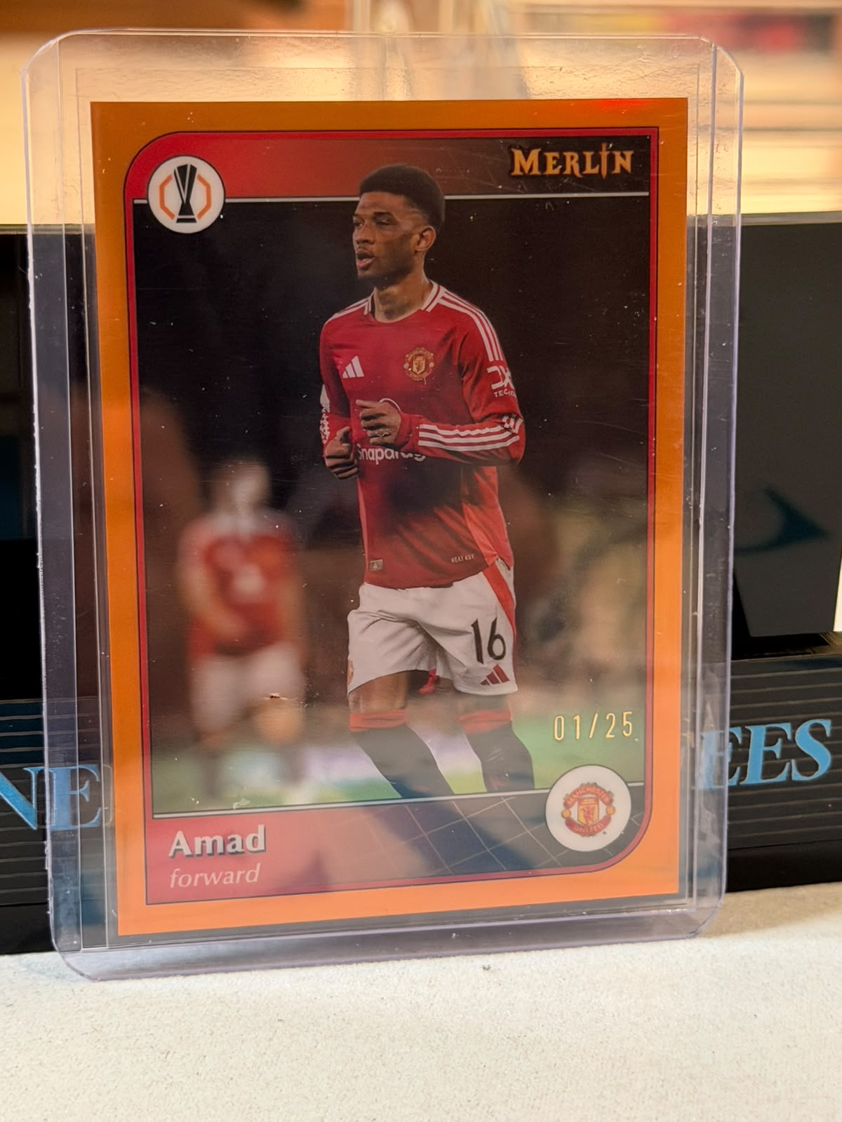 Amad Diallo 01/25 #117 – Orange Manchester United trading card, front