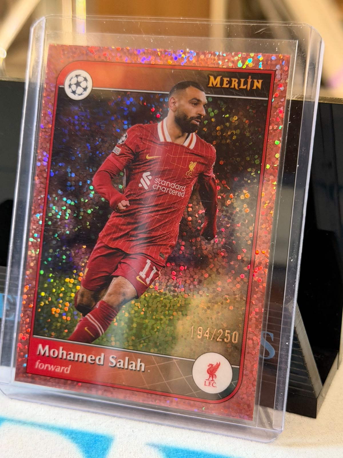 Mohamed Salah 194/250 Base #11, Red Glitter parallel – 2024/25 Topps Merlin, front