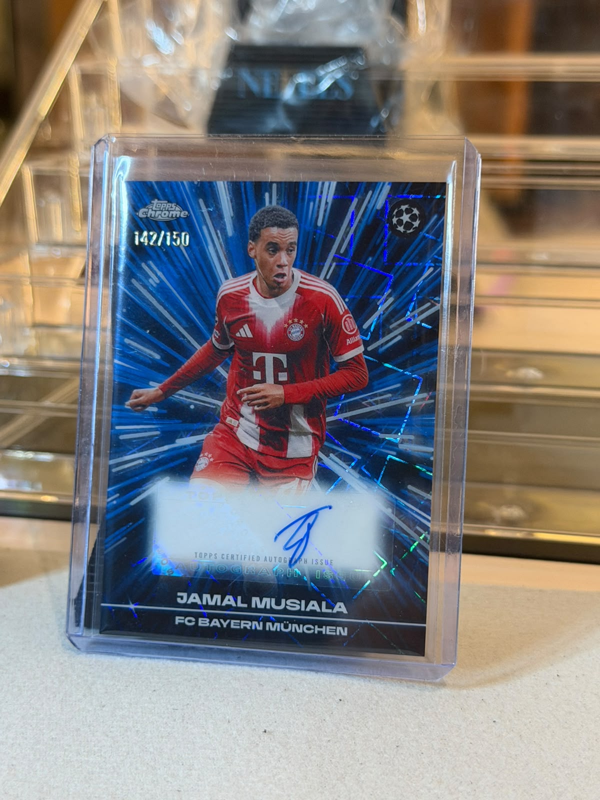 Jamal Musiala - 2026 Topps Chrome UEFA Club Competitions Black Lazer Autograph BLA-JM 142/150 - Front