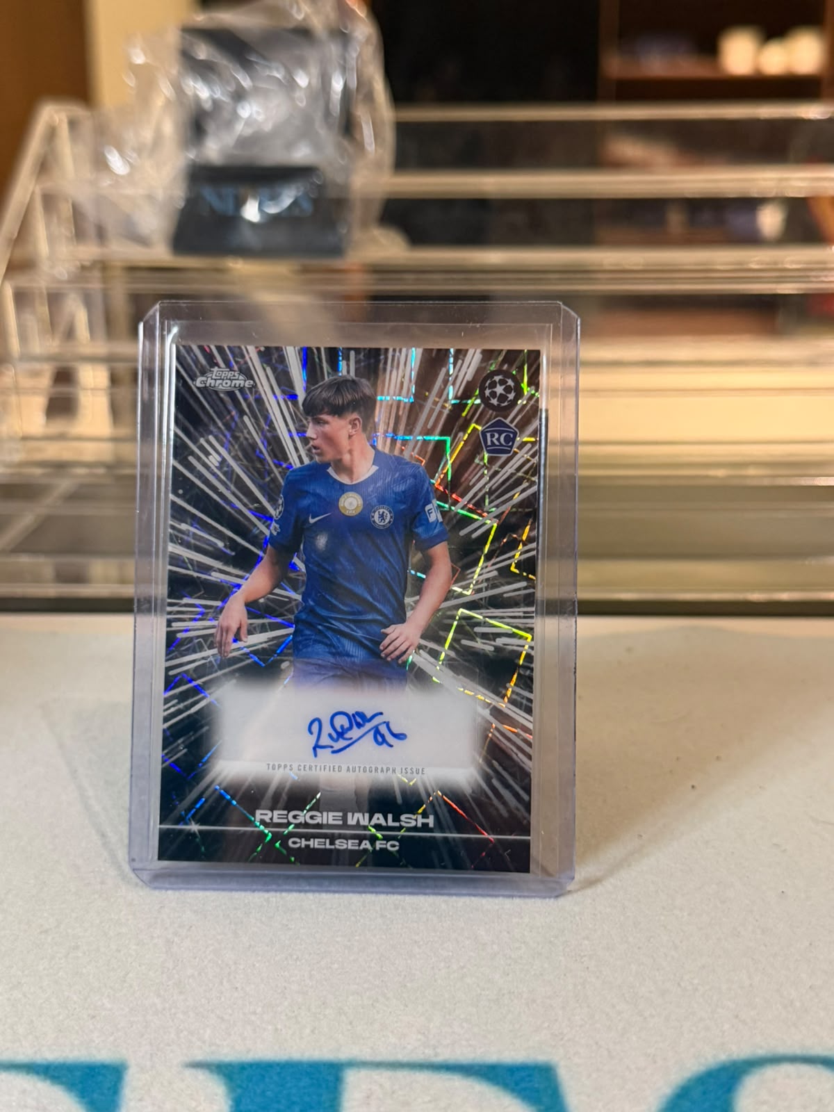 Reggie Walsh Chelsea 2025-26 Topps Chrome UEFA Club Competitions RC Black Lazer Autograph Parallel - front