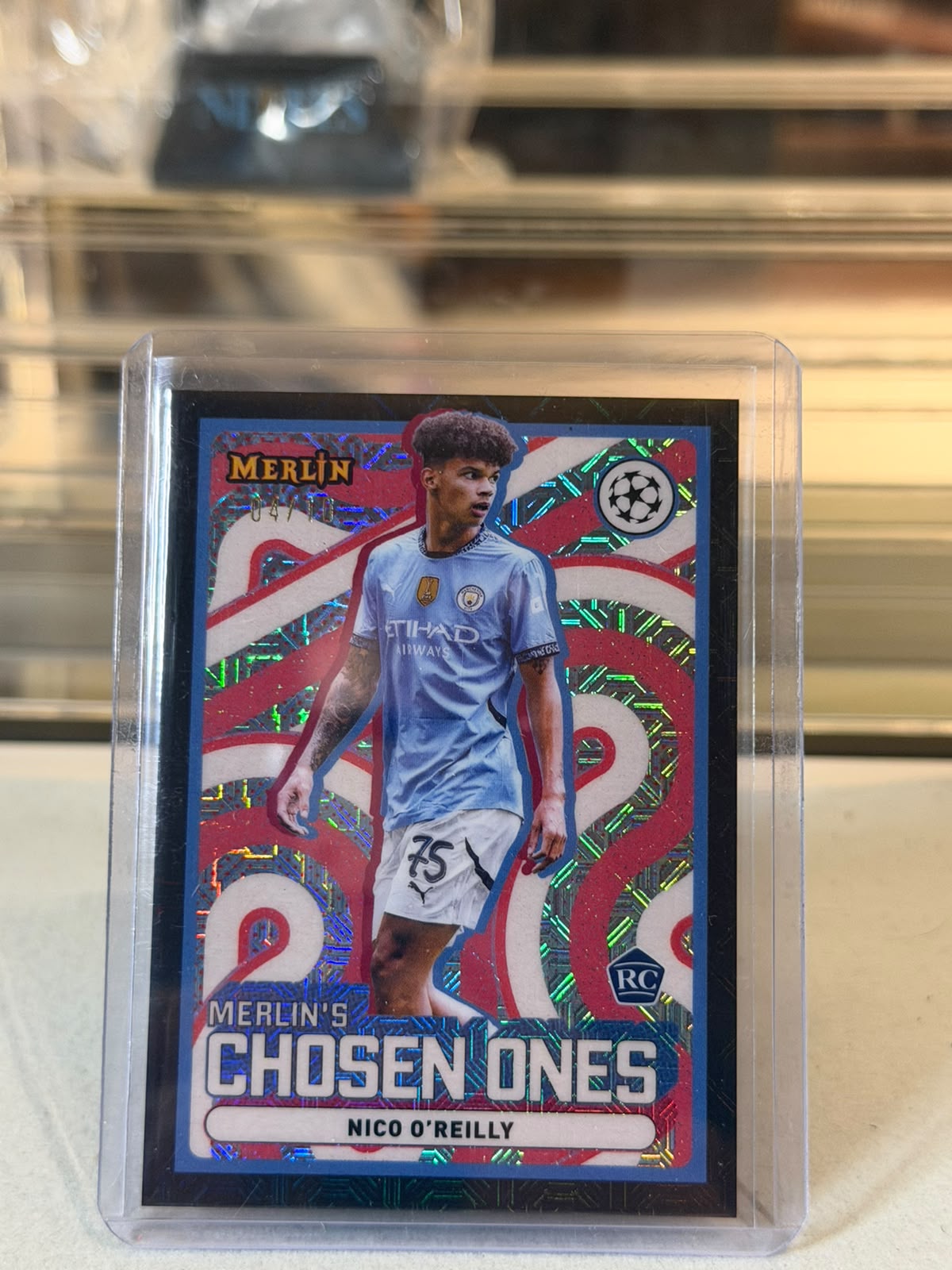 Nico O'Reilly Manchester City 2024/25 Topps UEFA Champions League Merlin's Chosen Ones rookie card #MC-14 04/10 front