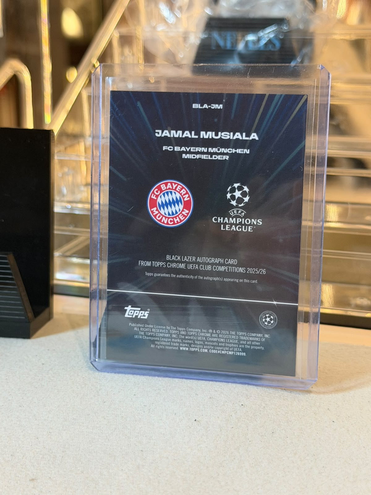 Jamal Musiala - 2026 Topps Chrome UEFA Club Competitions Black Lazer Autograph BLA-JM 142/150 - Back