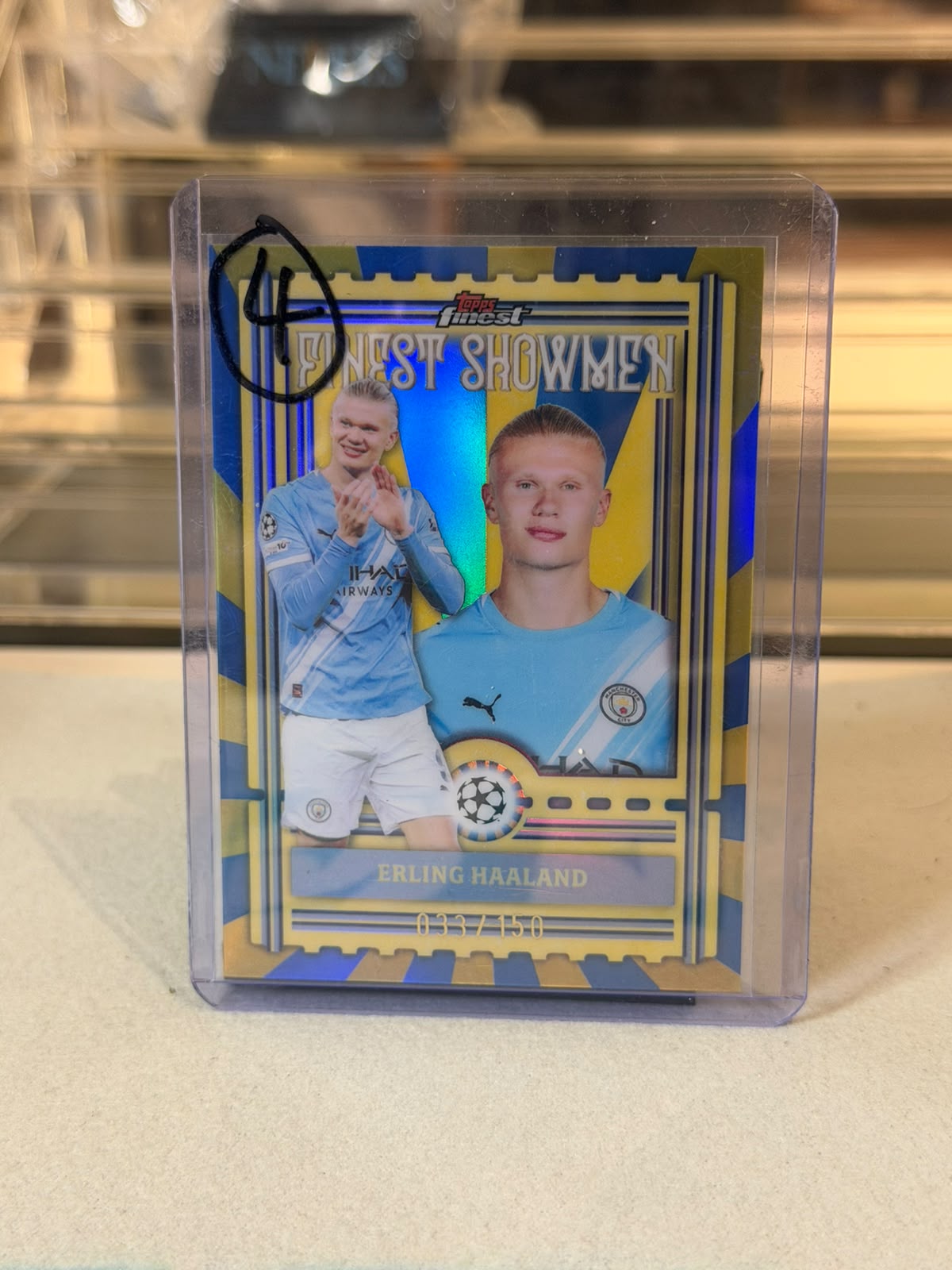 Erling Haaland Manchester City 2026 Topps Finest Finest Showmen Gold Blue Refractor 033/150 - front