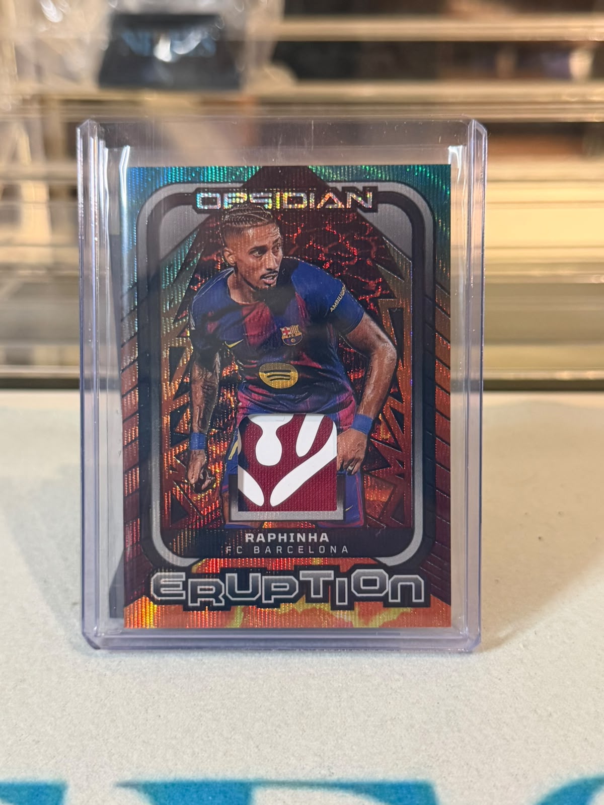 Raphinha FC Barcelona Panini Obsidian Eruption card image A - C0000692