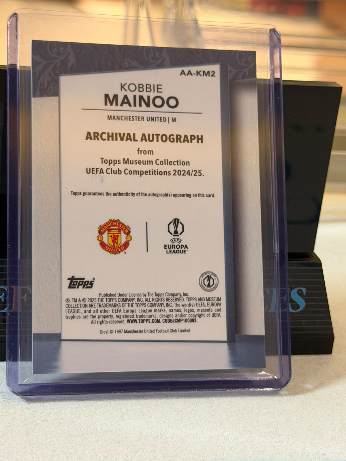 Kobbie Mainoo 92/99 – Archival Autograph (AA-KM2) Manchester United trading card, back