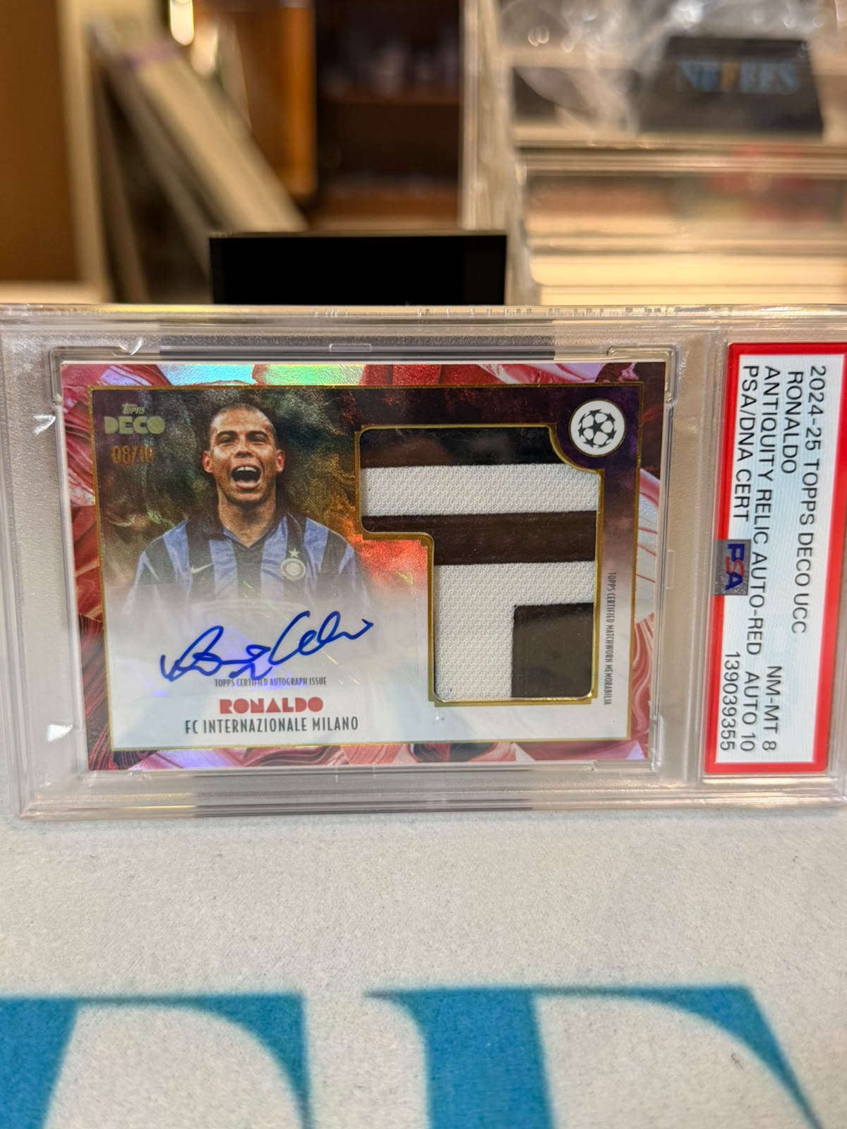 Ronaldo front - 2024/25 Topps Deco UEFA Club Competitions Antiquity 08/10 PSA 8