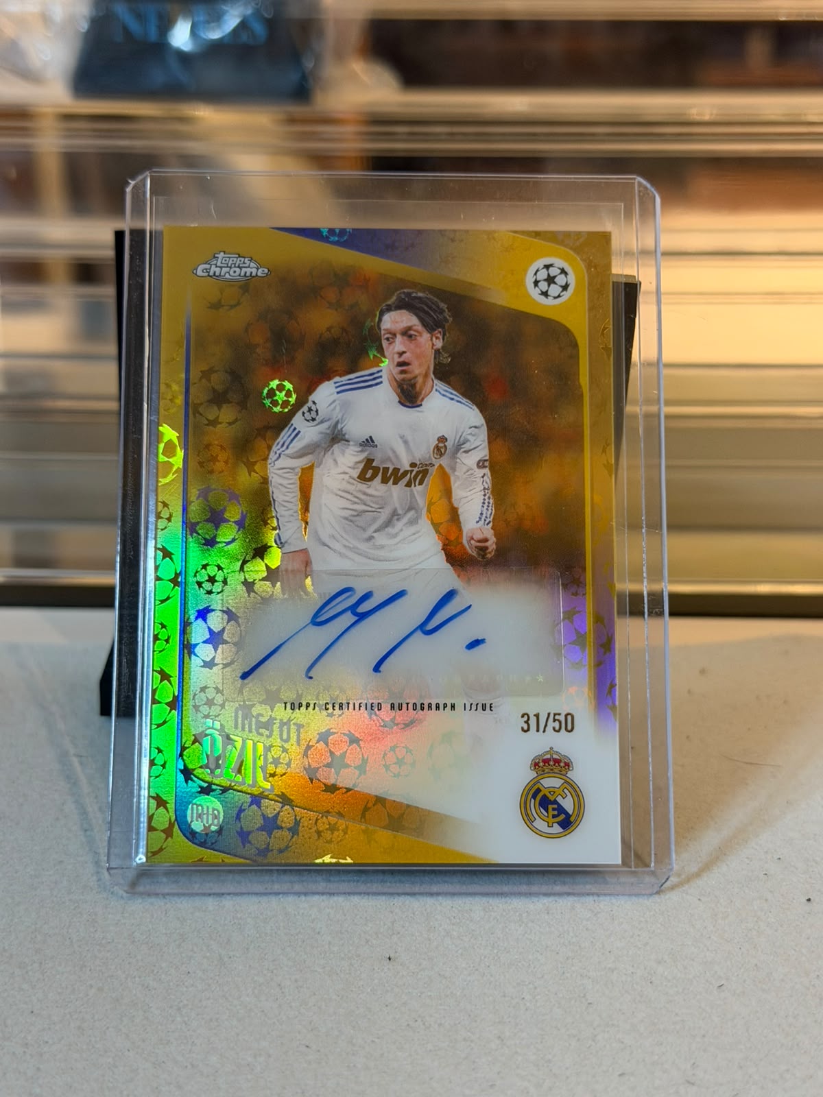Mesut Ozil Real Madrid Legend Autograph Card front, 2025/26 Topps Chrome UEFA Club Competitions Gold Parallel #CLA-MO, serial 31/50