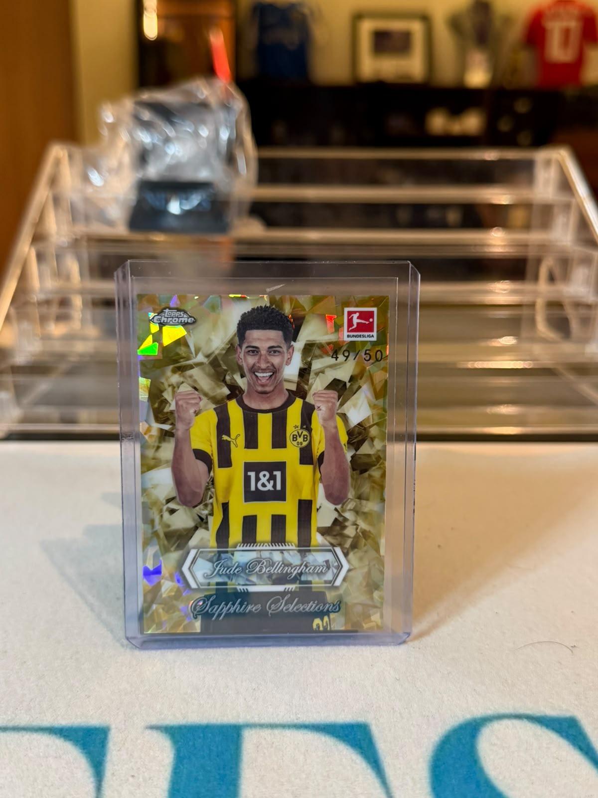 Jude Bellingham Borussia Dortmund, 2026 Topps Chrome Bundesliga, Sapphire Selections SAP-2 gold crystal refractor parallel, serial 49/50, front