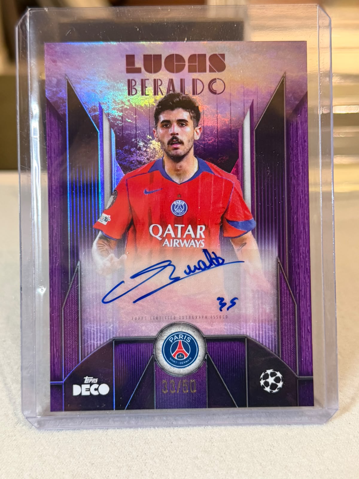 Lucas Beraldo 33/50 Current Stars Autograph Purple 2025/26 Topps Deco UEFA – PSG trading card, front