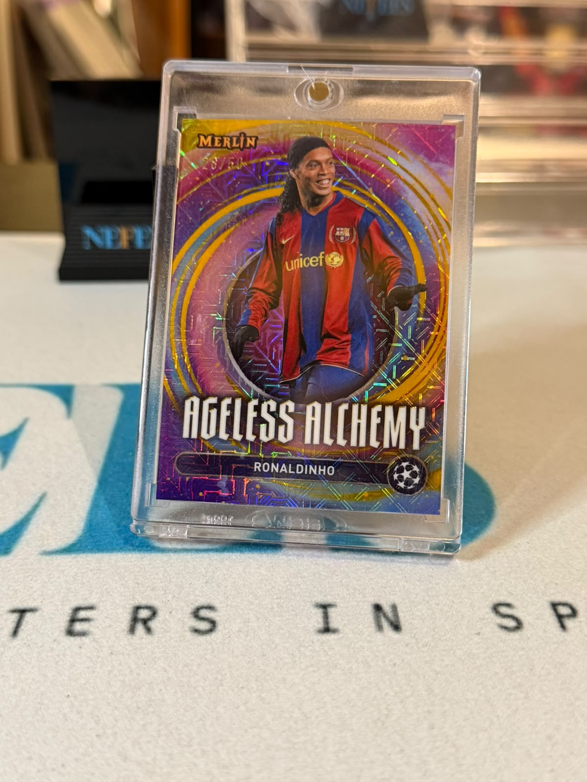 Ronaldinho 28/50 Ageless Alchemy – 2025 Topps Merlin UEFA Champions League – FC Barcelona trading card, front