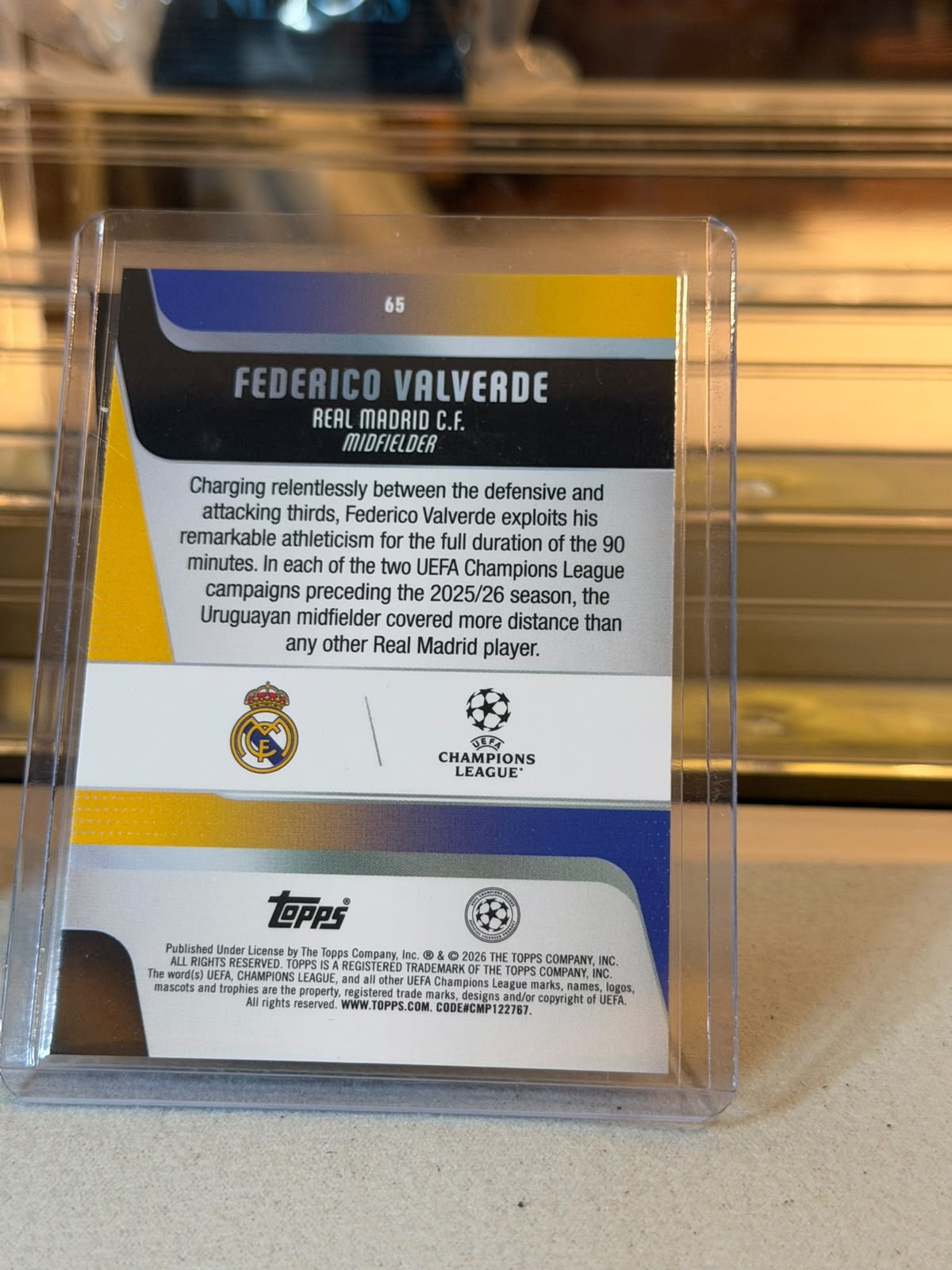 Federico Valverde C0000600 back - Federico Valverde 3/5 #65 – Real Madrid – Red/Gold Wave Parallel – 2025-26 Topps UEFA Champions League
