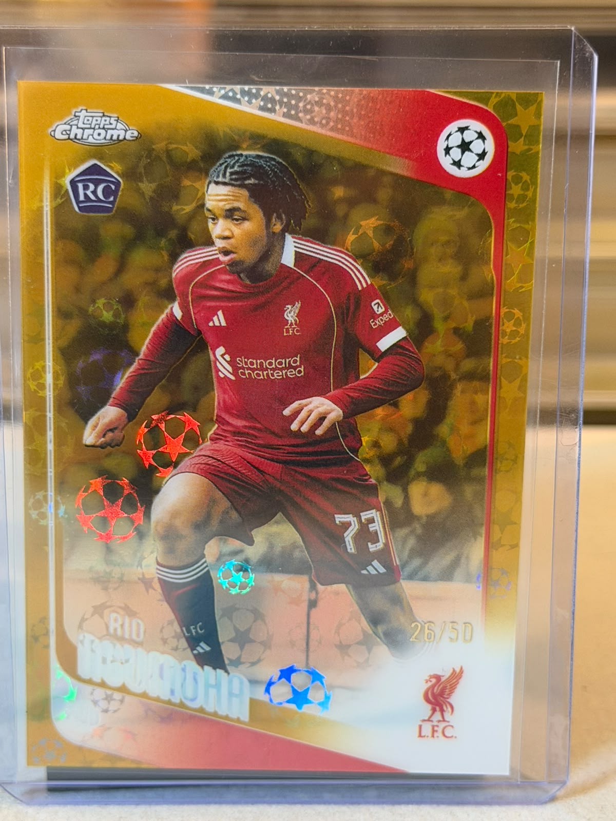 Rio Ngumoha Liverpool rookie card, 2026 Topps Chrome UEFA Club Competitions card 191, gold star sparkle refractor, serial 26/50, front