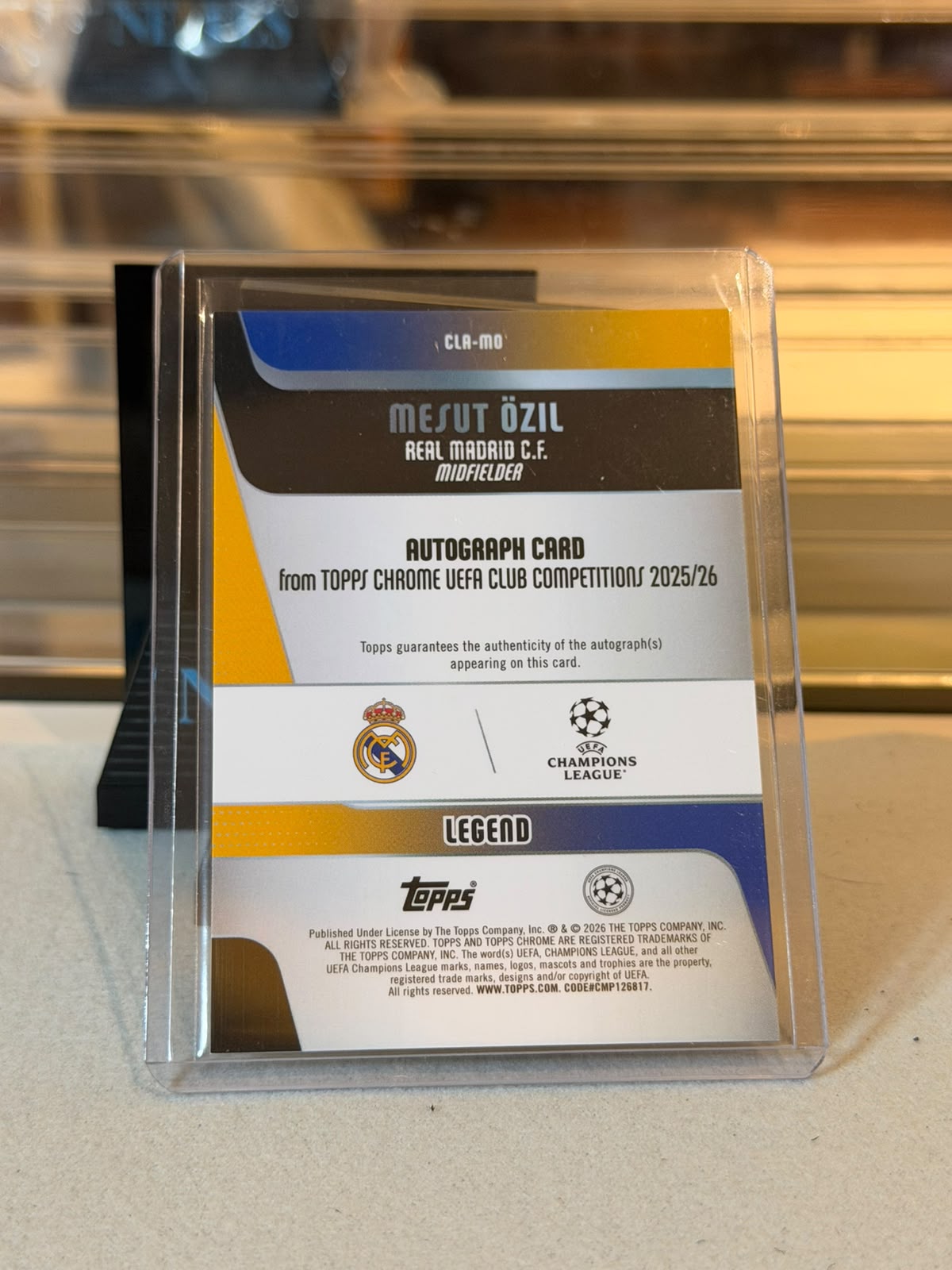 Mesut Ozil Real Madrid Legend Autograph Card back, 2025/26 Topps Chrome UEFA Club Competitions Gold Parallel #CLA-MO, serial 31/50
