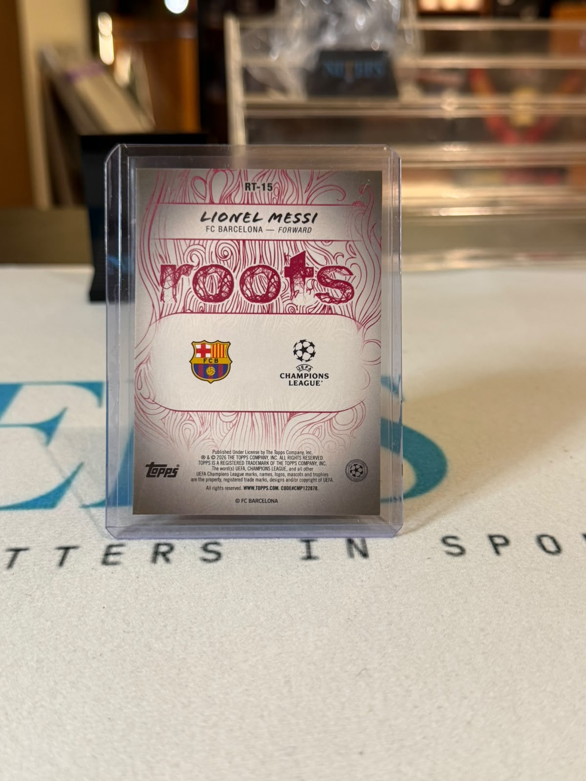 Lionel Messi 43/99 Roots, green foil – 2026 Topps Roots – FC Barcelona trading card, back