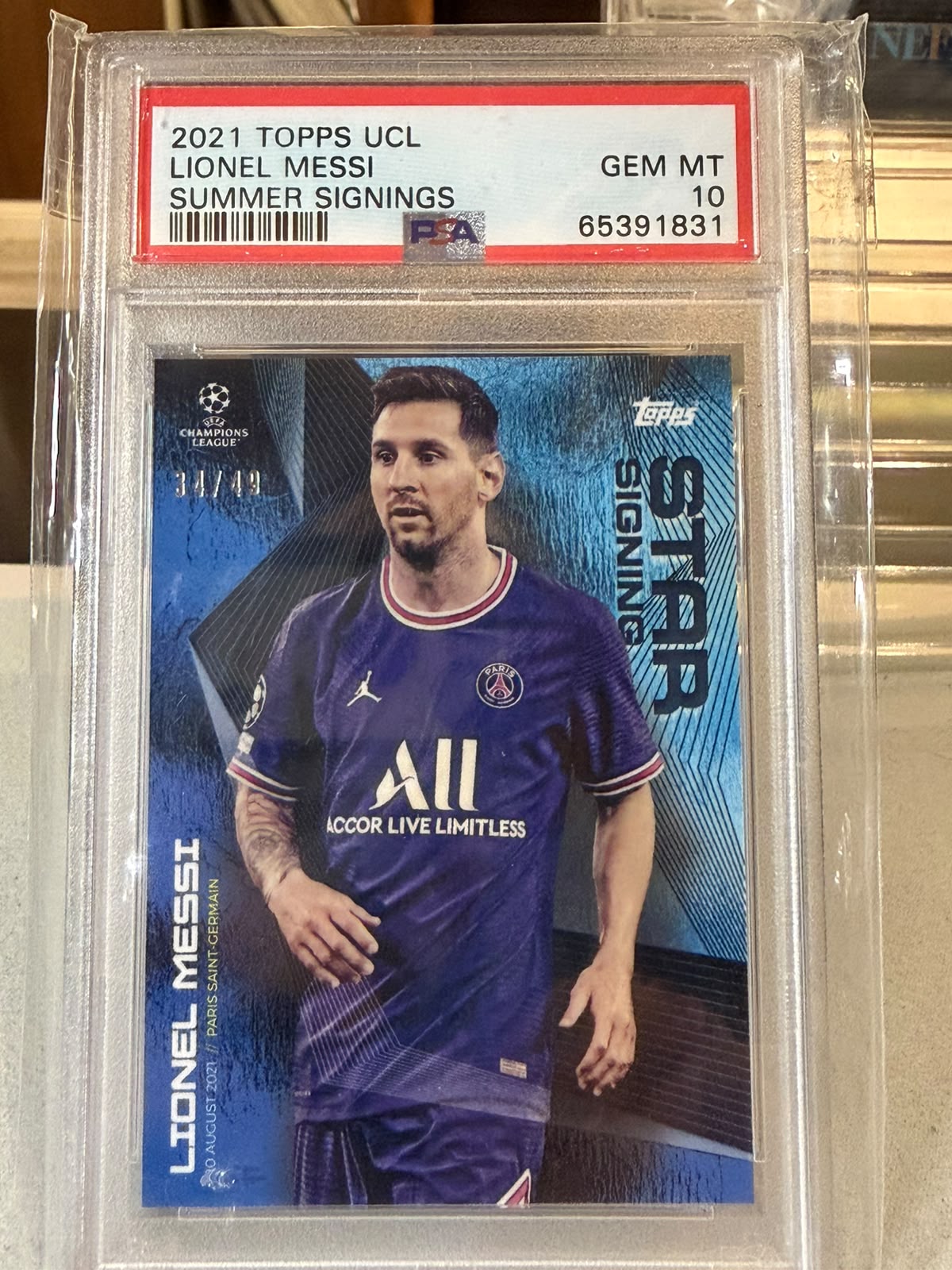 Lionel Messi 34/49 Summer Signings Blue 2021 Topps UCL PSA 10 – PSG trading card, front