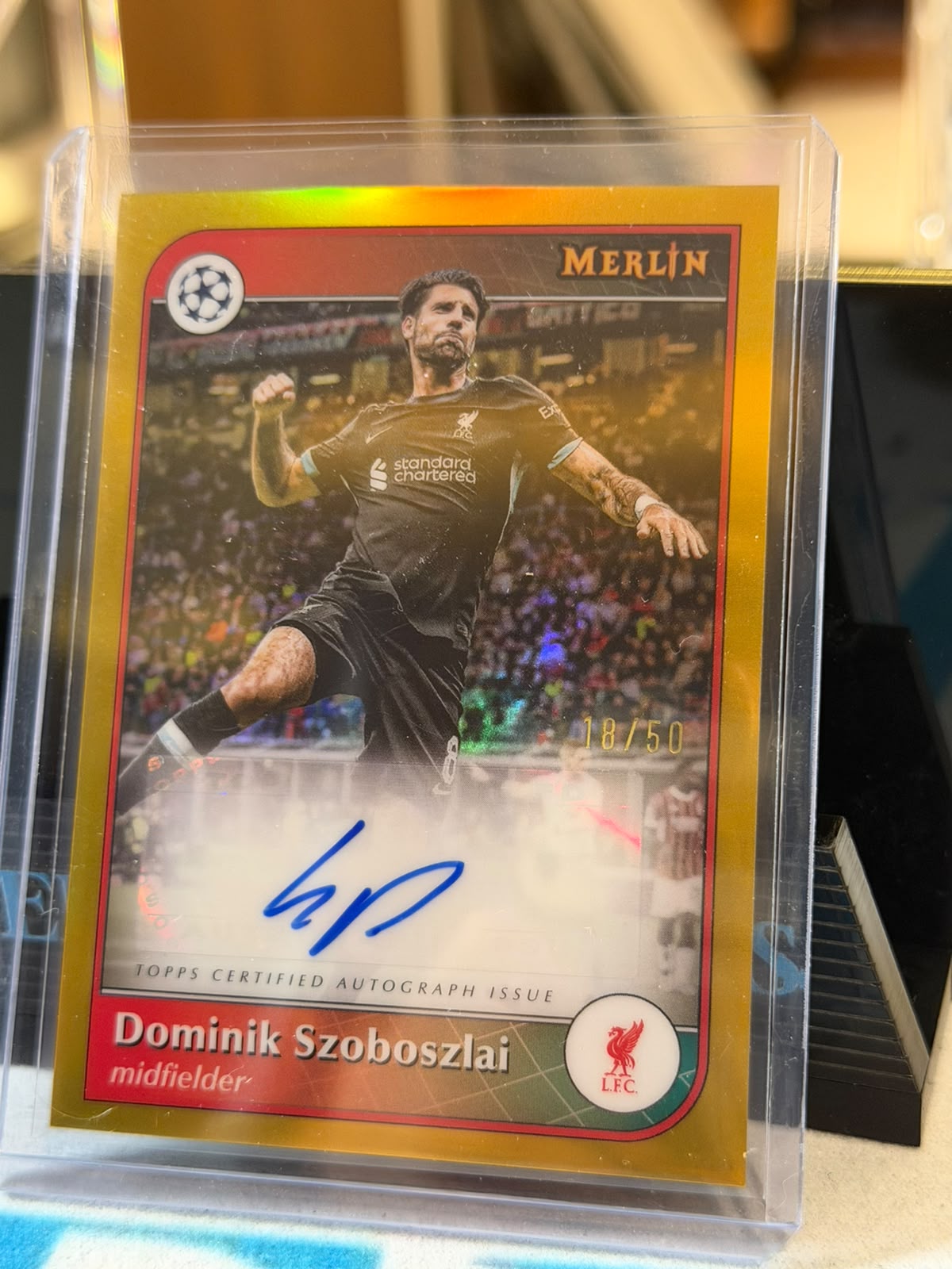 Dominik Szoboszlai 18/50 Autograph (AU-DS), Gold parallel – 2024/25 Topps Merlin UEFA Club Competitions, front