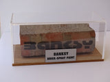 "Brick-Spray Paint" Banksy (attributed), side view