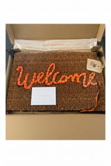 "Welcome Mat" by Banksy, numbered 588/1000, front view