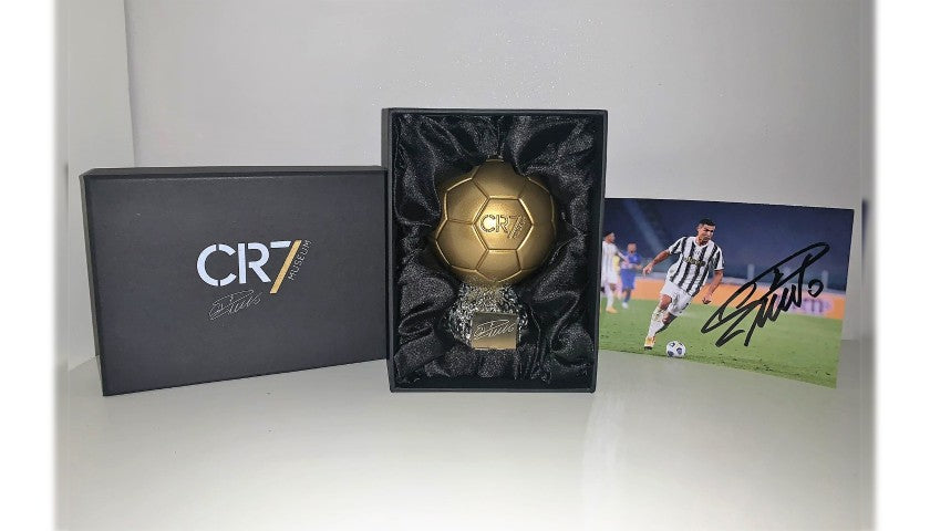 Cristiano Ronaldo signed photograph displayed on a flat surface