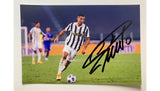 Close-up of Cristiano Ronaldo's signature on the photograph