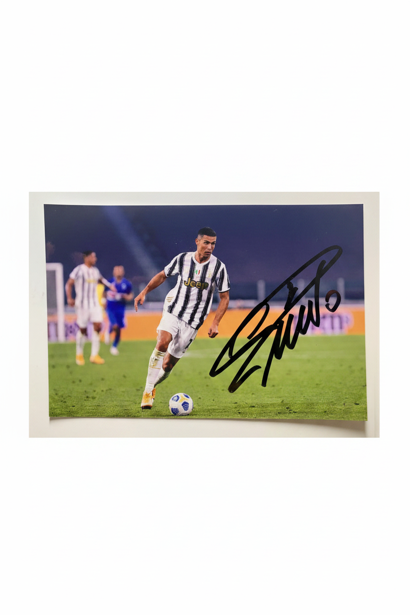 Signed photograph of Cristiano Ronaldo in action during a Serie A 2020/21 match