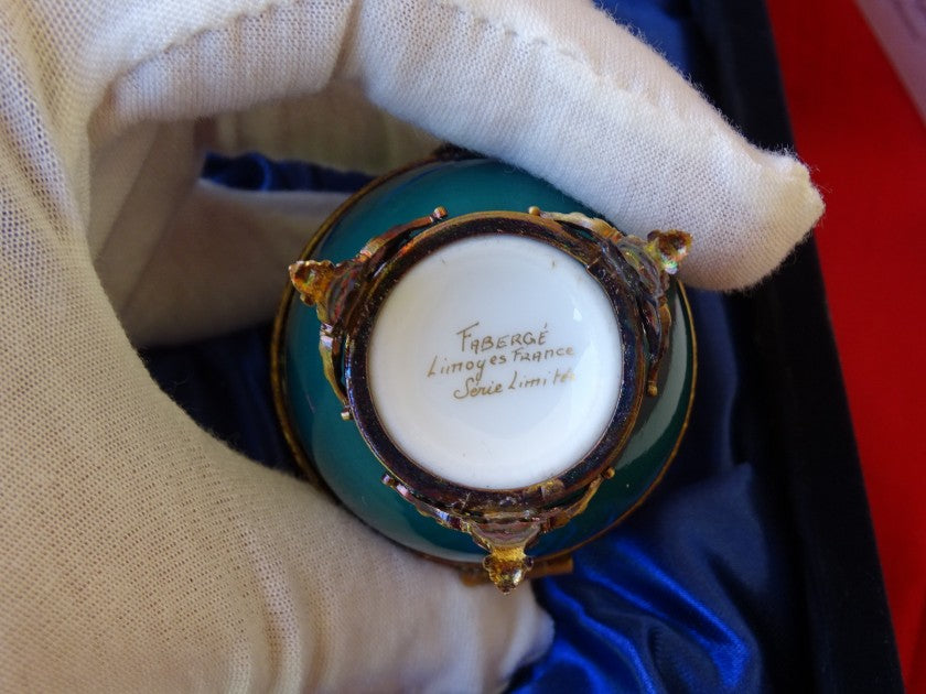 Fabergé Imperial egg shown with numbered certificate of authenticity
